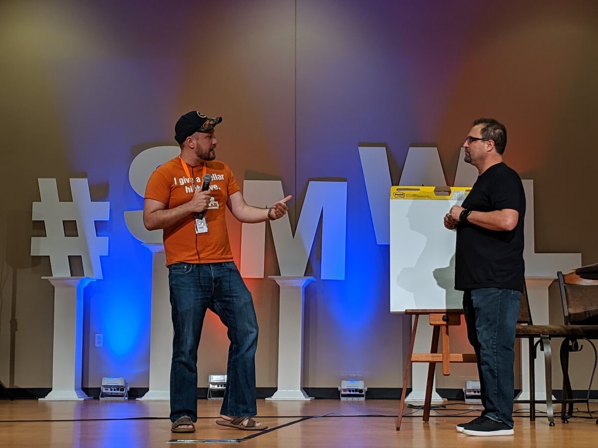 Dan Willis speaking on stage